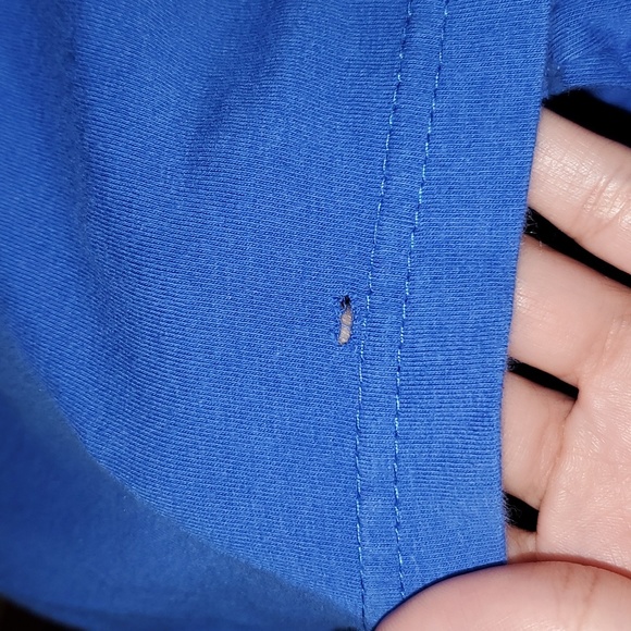 Short sleeve, scoop neck top with multi-bedazzled "GUESS" logo on front medium - Picture 11 of 11